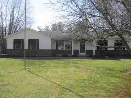 $103,000
Great Potential. Enjoy the large backyard with mature pines from the covered