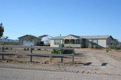 $105,000
Golden Valley, This Three BR Two BA groundset mobile has