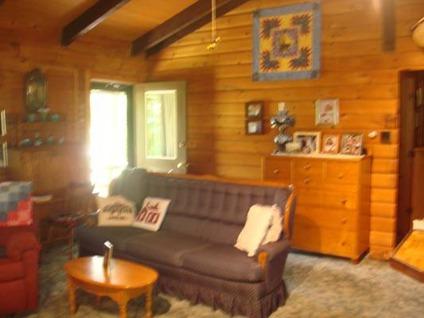 $114,900
De Kalb Junction 3BR, Log cabin on country road in the town