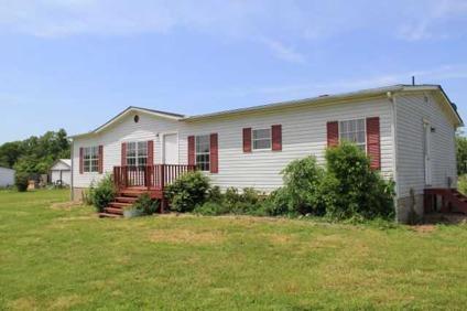 $115,000
Own your own piece of rural paradise! Freshly painted manufactured home with a