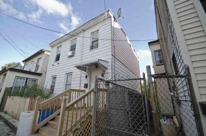 $119,000
Paterson, Four bedroom three bathroom multifamily home