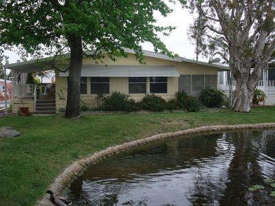 $125,000
Spacious living on lake and greenbelt - mobile home, 55+ -gated