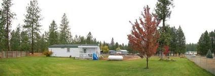 $129,400
Nine Mile Falls Three BR Two BA, Great Buy!! Beautiful rancher sits