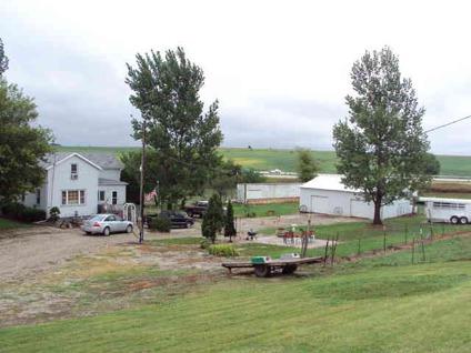 $135,000
Alpha 4BR 1BA, pastures fenced. Wonderful 7 stall horse barn