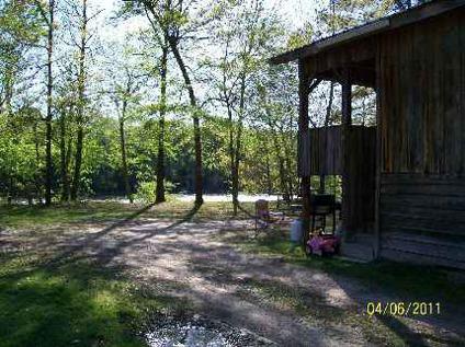 $140,000
Cabin on the bank of the Ouachita River