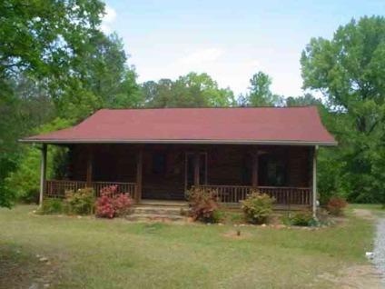 $140,000
Unique log cabin situated on 1.5 Acres!