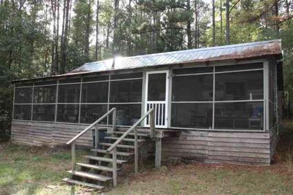 $145,000
This cabin which sits on 30 acres has a large living area, One BR and One BA