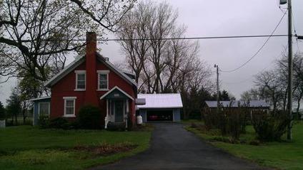 $147,000
Warmth and Charm fills this 4 bedroom 2.5 bath country farm home