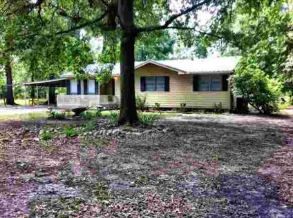 $150,000
Spacious Four BR/Two BA home on 4 acres in Tarkington ISD. This house backs up t