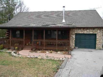 $152,500
This multi-level 3 BR, Two BA all electric oak log home is with-in