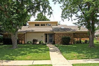 $154,900
Plano 3BR 2BA, In the den a stained wood beam accents the