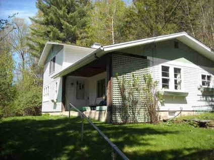 $165,000
Stowe Four BR Two BA, LOCATED ON STOWE HOLLOW ROAD WITHIN WALKING