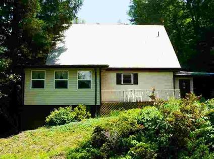 $165,000
Sweet A-frame chalet with huge potential on nearly six private and completely
