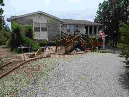 $174,900
A Country Club Hills subdivision home overlooking Bull Shoals Lake with year