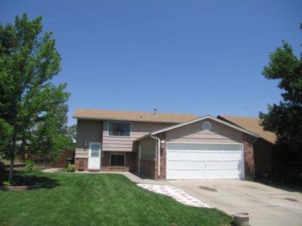 $175,000
Loveland 4BR 2BA, Backs to open space with a lake view from