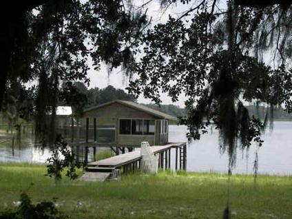 $178,000
2+ Acres-Lakefront Lot- W/Enclosed Boathouse/Dock/Well