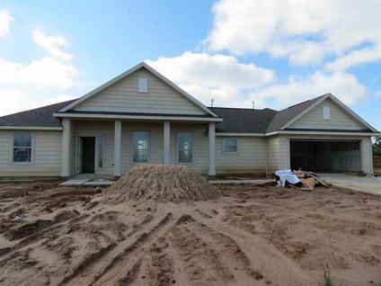 $179,565
One story w/fireplace w/wood and tile mantle. Open plan w/living area open to