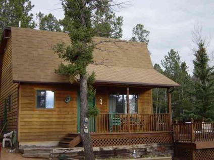 $179,900
Divide 3BR 2BA, Cute cabin in the woods located on two lots.