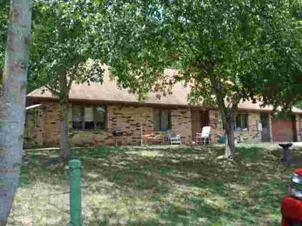 $185,000
1705F-You'll love this spacious earth contact home on 21.8 acres! Hwy.
