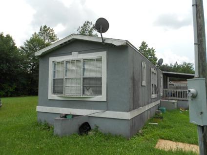 $18,900
mobile home and land