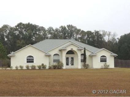 $195,500
High Springs, Take a look at this large Four BR/Three BA