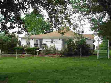 $199,000
Nice farm located on blacktop not far from town. 3 bedroom updated farm house.