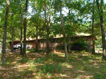 $199,900
3 bedroom/3 bath Ranch Style home with park like setting on 20 acres!