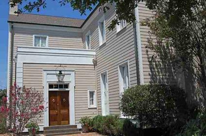 $1,195,000
Elegant and classic, this Old Metairie, split-level home is situated on serene