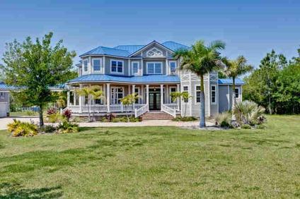 $1,495,000
This grand old-Florida style home is situated on 5 acres & is 6000 square feet.
