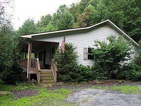 $205,000
Vilas, Neat 3BR/2BA open 1-level plan ranch in natural