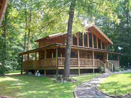 $209,900
Lenoir 2BA, Beautiful log cabin with large half acre stocked