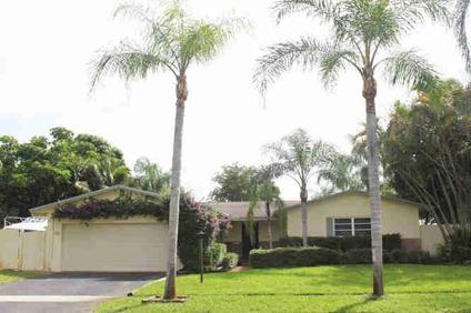 $215,000
Fantastic Tropical Home! 4/2 with 2 car garage pool home! Must see!