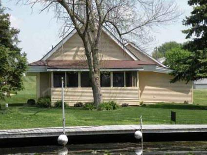 $217,000
Charming!!! Lake Wawasee Channel Front Home