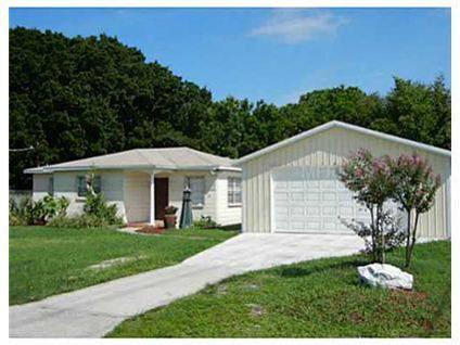 $222,000
Tampa, 4 bedroom / 2 Bath on fenced corner 1/4 acre lot in