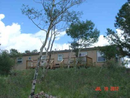 $225,000
Como 3BR 2BA, Very private 4ac treed parcel with huge