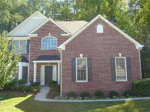 $225,000
Gorgeous Three-Sided Brick Home with Side Entry Garage in Gated Community with