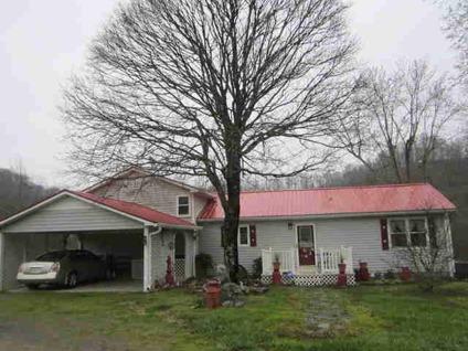 $225,000
WOODED RETREAT AWAITS YOU HERE-Original home built in '54 was completely