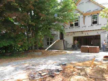 $230,000
Relax in the basement or great room & enjoy the private wooded view.