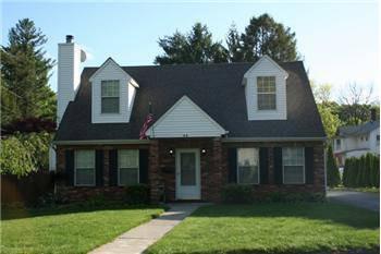 $239,000
Brick front Cape style home