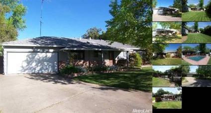 $240,000
Charming Home With Amazing Pool And Backyard! $1200 Down!
