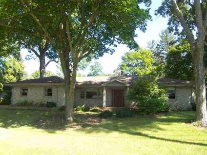$242,000
Sturdy Brick Ranch on Wooded Lot Just Steps from Crystal Lake!