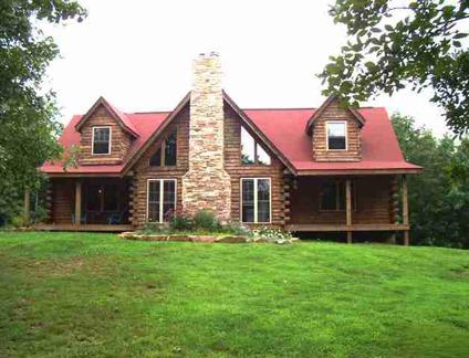 $245,000
3,122 Sq. Ft. LOG HOME on 19 Acres. 1 ½ Story Home has Great Rm tongue & grove
