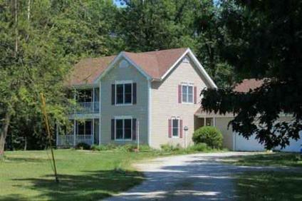 $250,000
Gorgeous 2 Story Home on 11.89 acres with Barn and Shared Lake