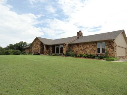 $259,900
Blanchard Four BR 2.5 BA, 5 acres with trees, situated for