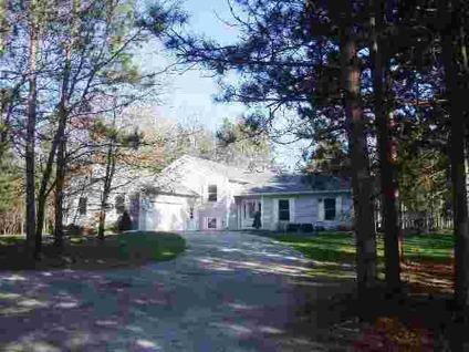 $259,900
Manistee, This 4 bedroom, 2 1/2 bath home is tucked into a