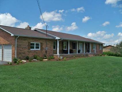 $264,500
Beckley, Spacious brick ranch affording privacy and offering