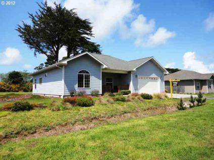 $269,000
Bandon 3BR 2BA, Covered porch welcomes you to this one level
