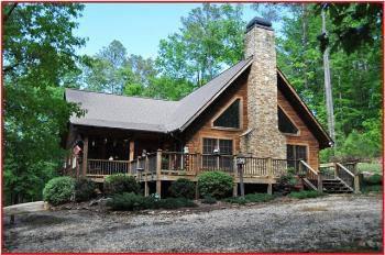 $279,900
Sterrett 2BA, This 1-1/2 story custom log home features 2