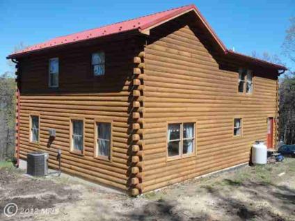 $285,000
New Creek 3BR 3BA, Amerlink Log home on 26.84 acres located