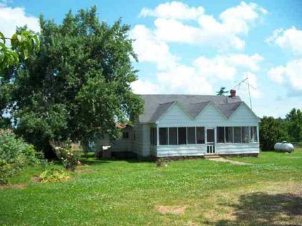 $285,000
Older Farm House with 87 + acres of improved pasture and timber